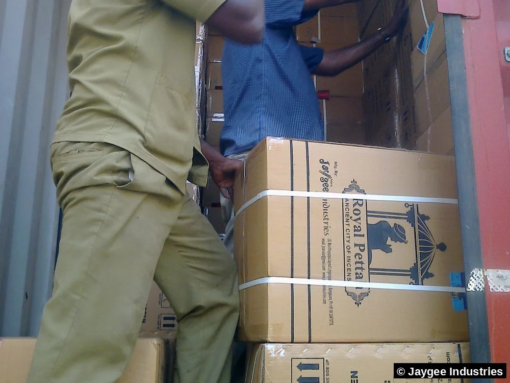 Royal Pettah by Jaygee Industries branded export cartons being loaded into a shipping container