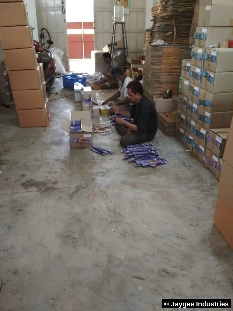 Jaygee Industries warehouse team hand-packing incense products for client orders